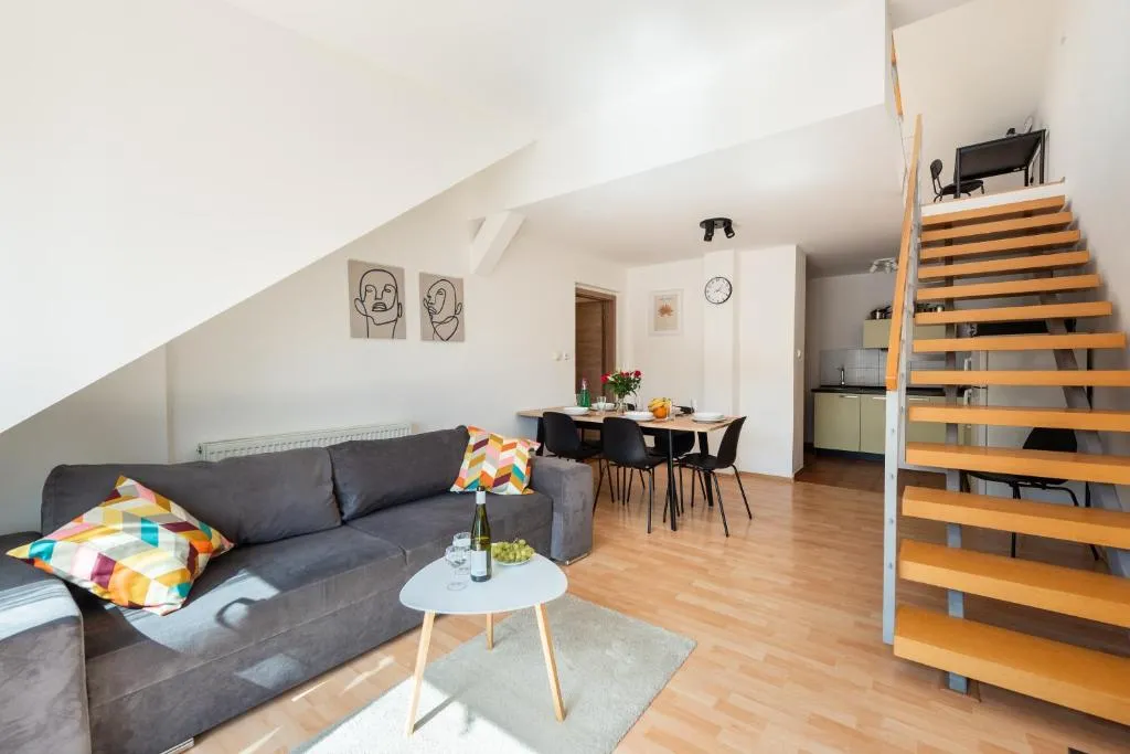 Image of 2-level apartment with large balcony