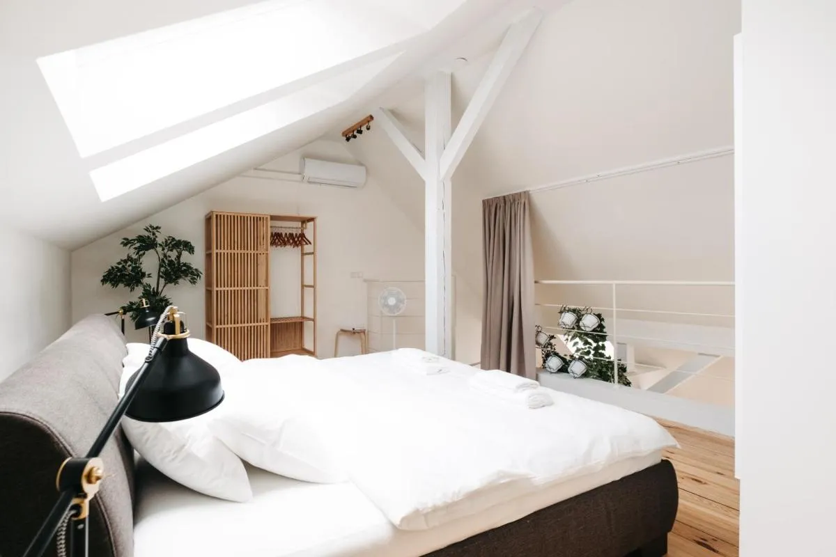 Image 1 of Modern Sunlit Loft with A/C in Prime Location